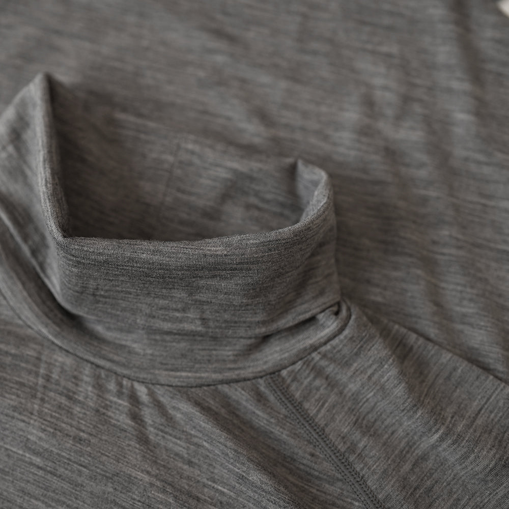 Isobaa | Mens 160 Merino Active Roll Neck (Charcoal Melange) | Embrace the chill in style with our Men's 160 Merino Active Roll Neck, crafted from 160g 18.5 micron superfine merino wool