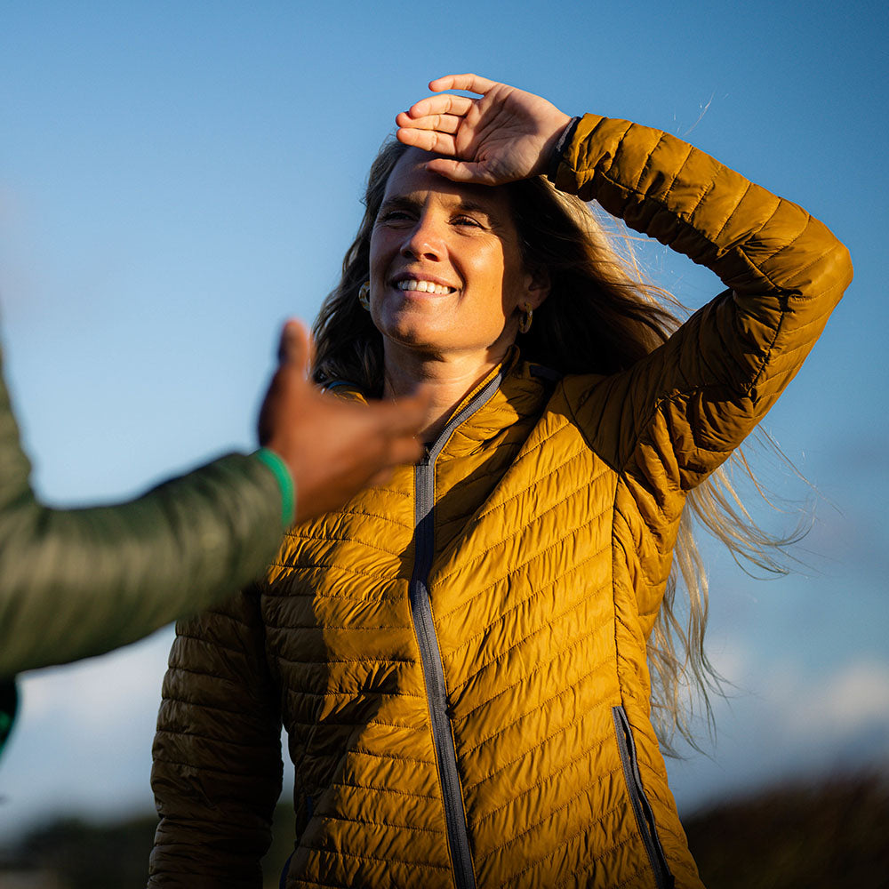 Isobaa | Womens Merino Wool Insulated Jacket (Mustard/Smoke) | Innovative and sustainable design with our Merino jacket. | Model: Amy