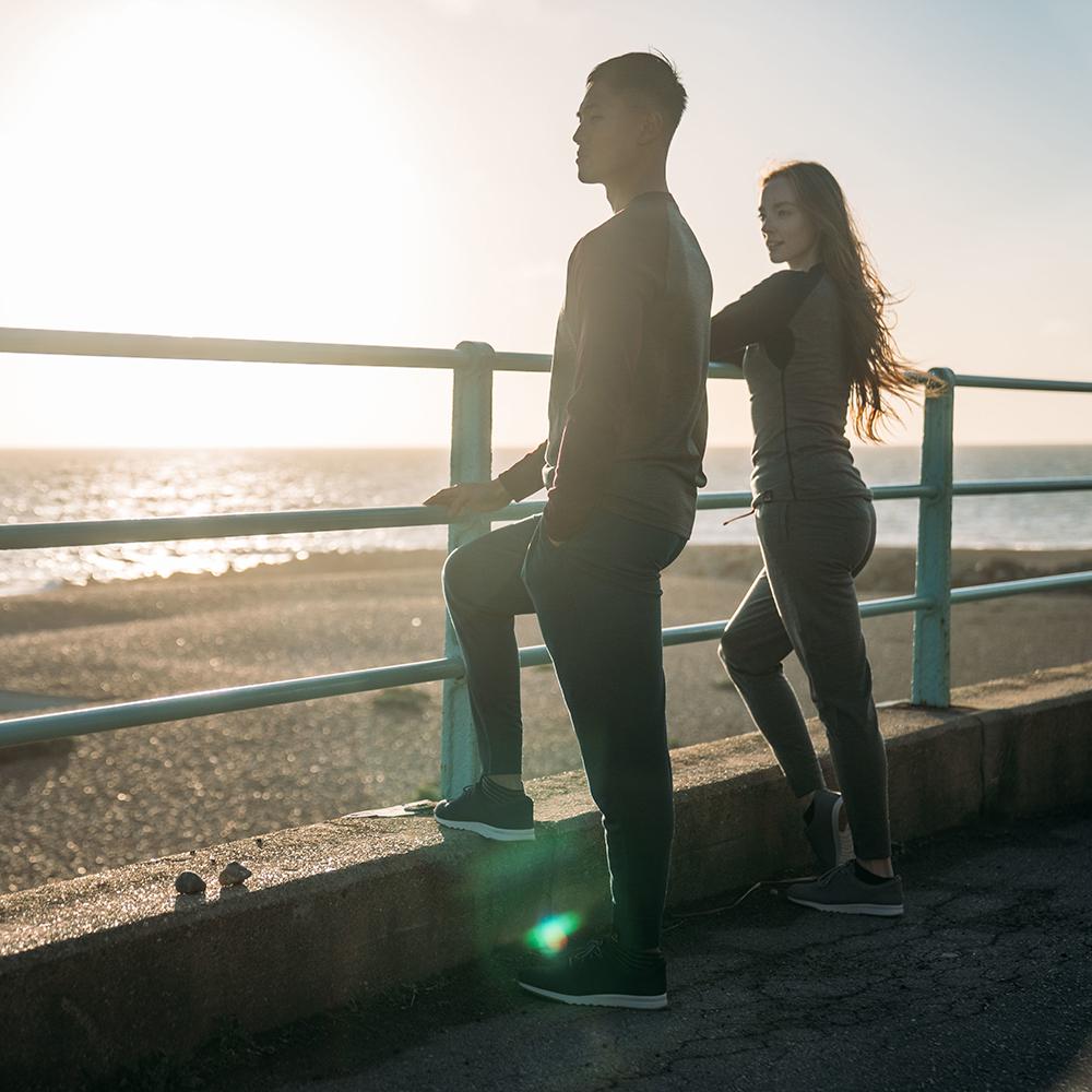 Isobaa | Womens Merino 260 Lounge Cuffed Joggers (Charcoal/Orange) | Discover unparalleled comfort and versatility with our luxurious 260gm Merino wool lounge joggers. | Model: Sophie