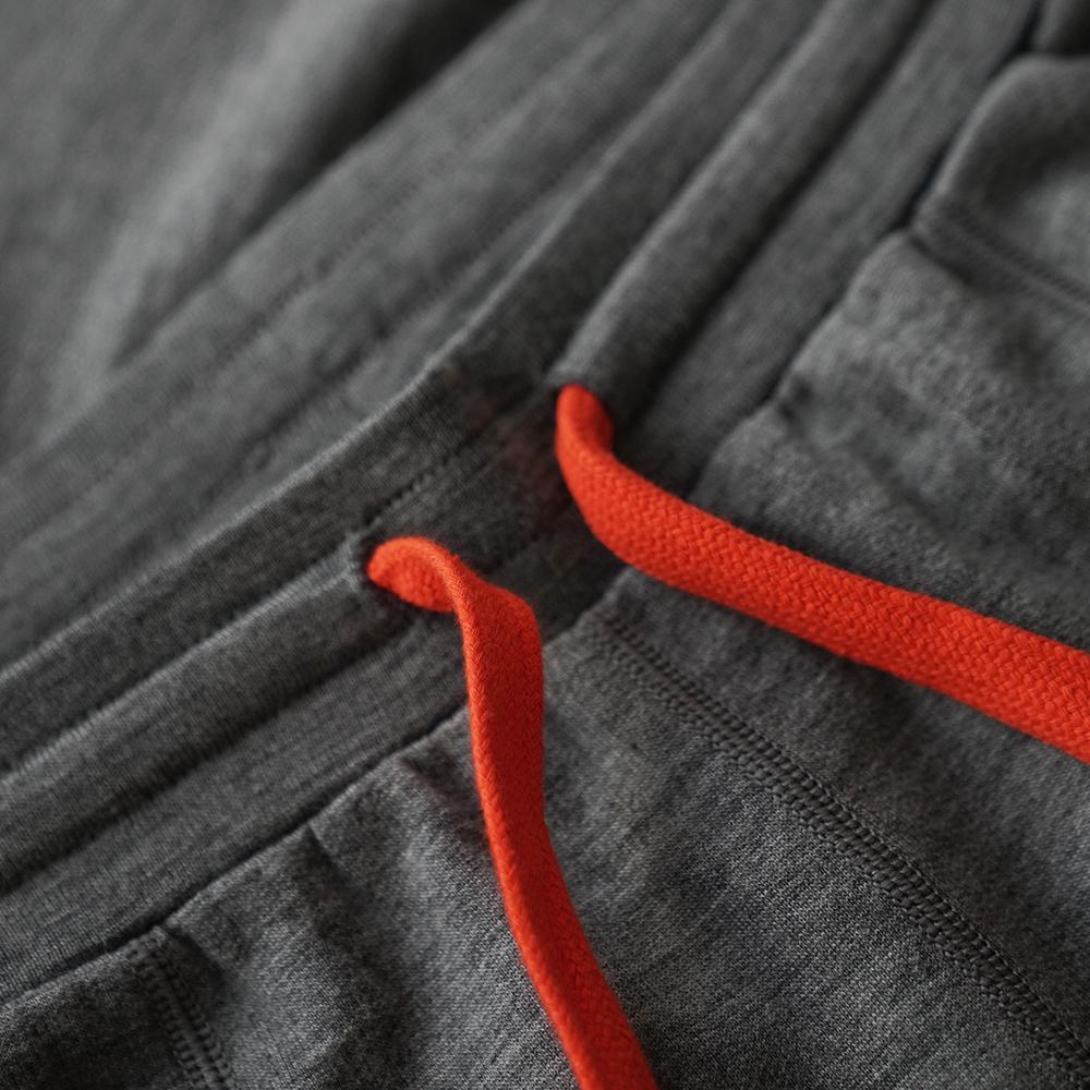 Isobaa | Womens Merino 260 Lounge Cuffed Joggers (Charcoal/Orange) | Discover unparalleled comfort and versatility with our luxurious 260gm Merino wool lounge joggers.