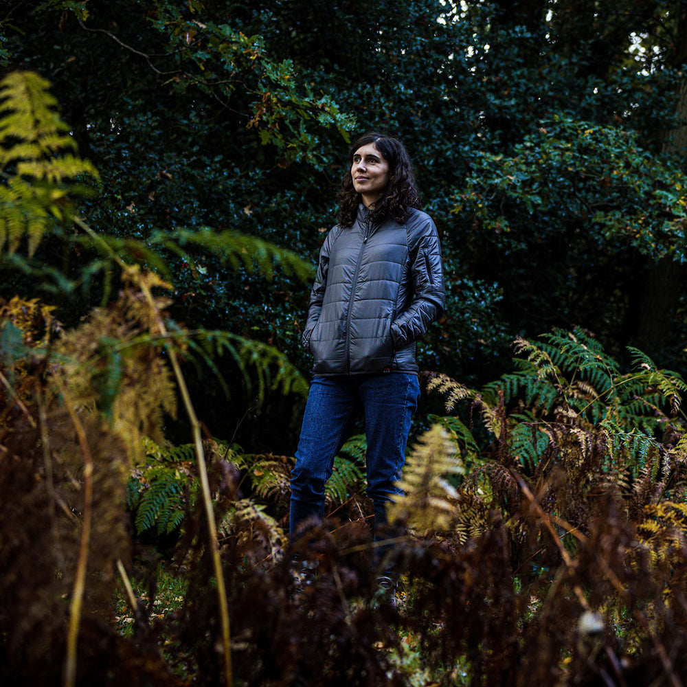 Isobaa | Womens Packable Insulated Jacket (Smoke/Black) | Exceptional warmth, packable convenience, and sustainable design with our lightweight Merino wool jacket. | Model: Clémentine