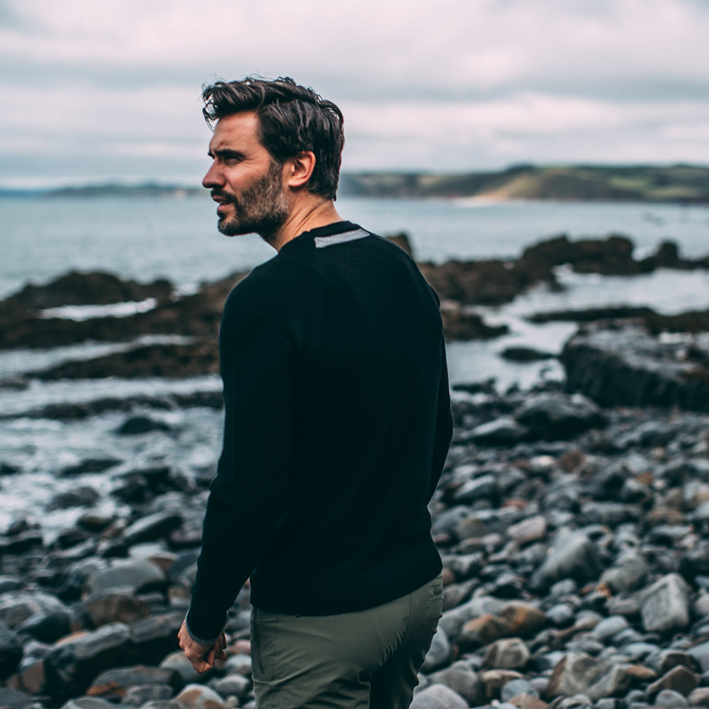 Isobaa | Mens Merino Crew Sweater (Black/Charcoal) | Everyday warmth and comfort with our superfine 12-gauge Merino wool crew neck sweater. | Model: Duncan
