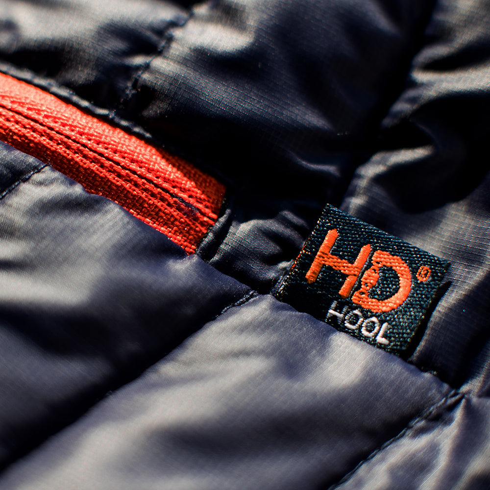 Isobaa | Womens Merino Wool Insulated Jacket (Navy/Orange) | Innovative and sustainable design with our Merino jacket.