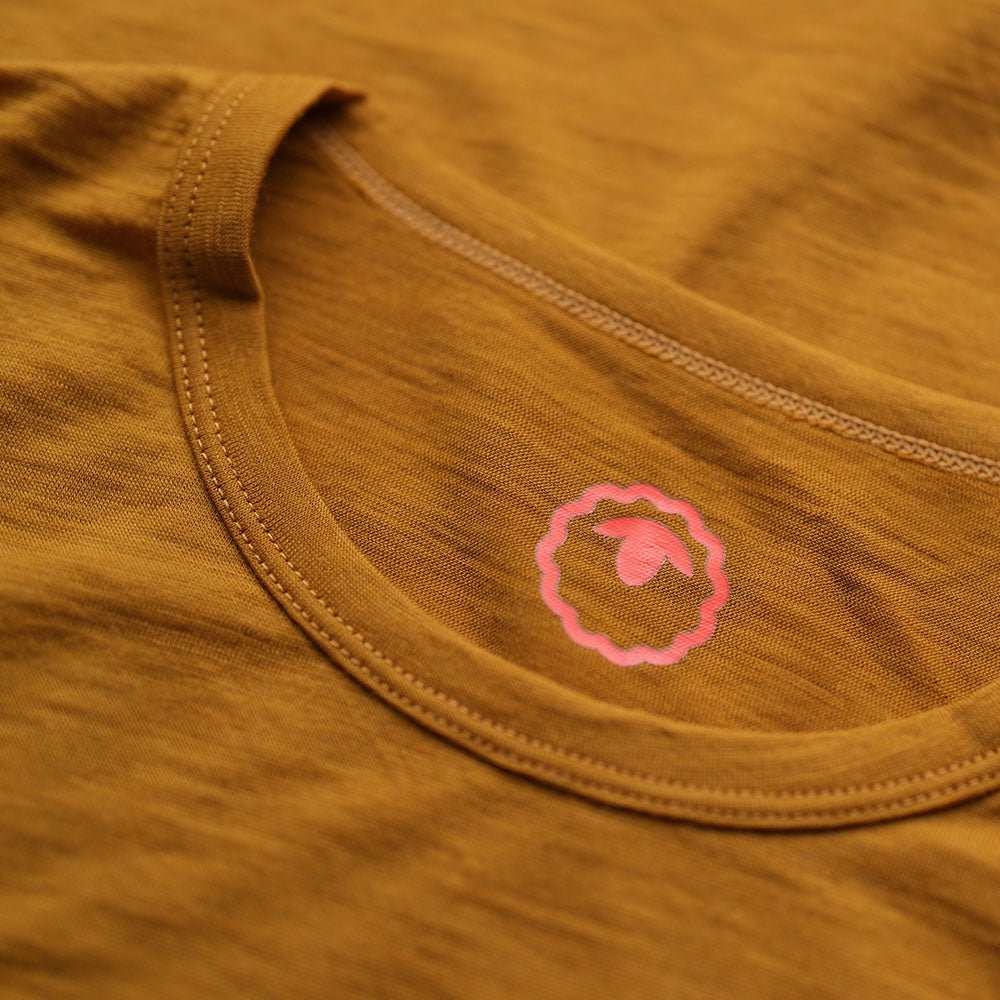 Isobaa | Mens Merino 150 Emblem Tee (Mustard/Navy) | Conquer trails and city streets in comfort with Isobaa's superfine Merino T-Shirt.