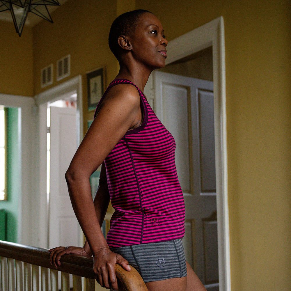 Isobaa | Womens Merino 150 Vest (Stripe Wine/Fuchsia) | Be ready for any adventure with Isobaa's superfine Merino sleeveless Vest. | Model: Yolisa