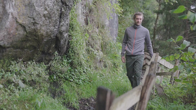 Isobaa | Mens 320 Merino Full Zip (Charcoal/Orange) | Step into a new level of comfort and versatility with our 320 Merino Full Zip Jacket | align: 75% 25% | Model: Baudoin