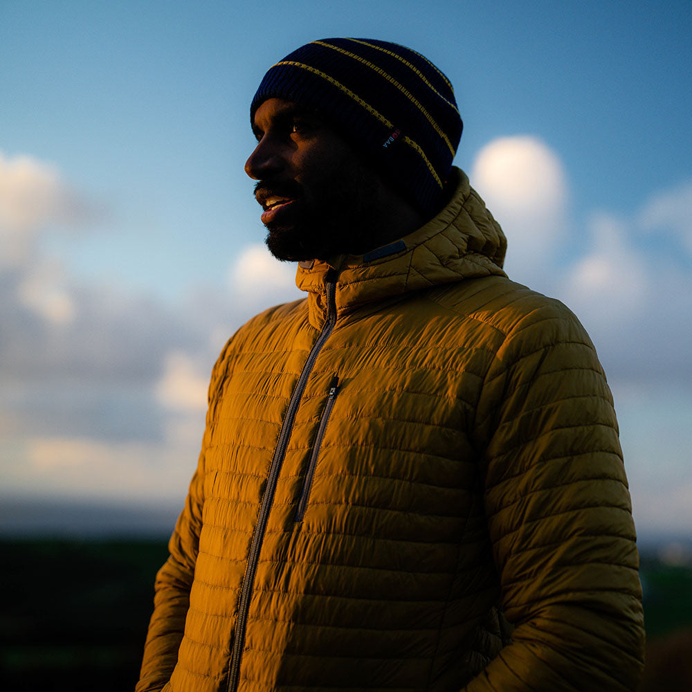 Isobaa | Mens Merino Wool Insulated Jacket (Mustard/Smoke) | Innovative and sustainable design with our Merino jacket. | Model: Michael