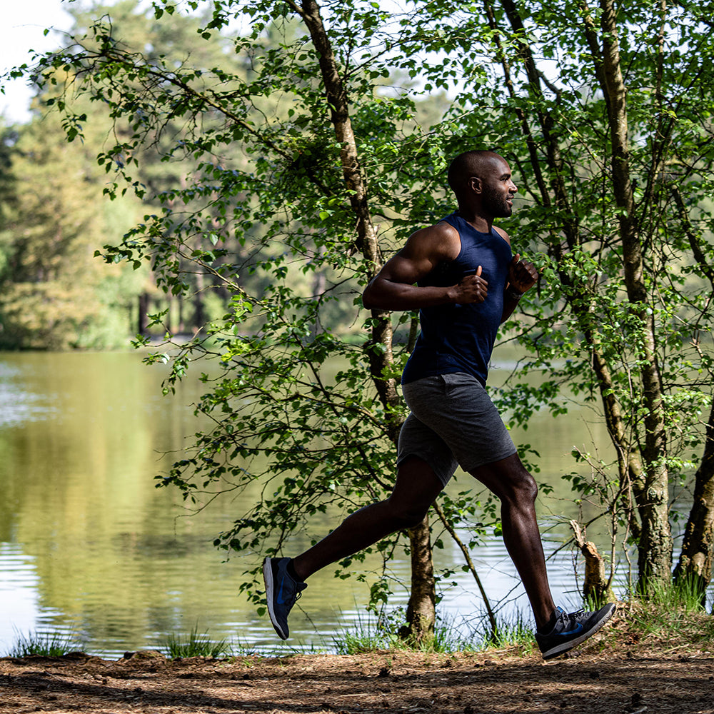 Isobaa | Mens Merino 150 Vest (Navy) | Be ready for any adventure with Isobaa's superfine Merino sleeveless Vest. | Model: Michael