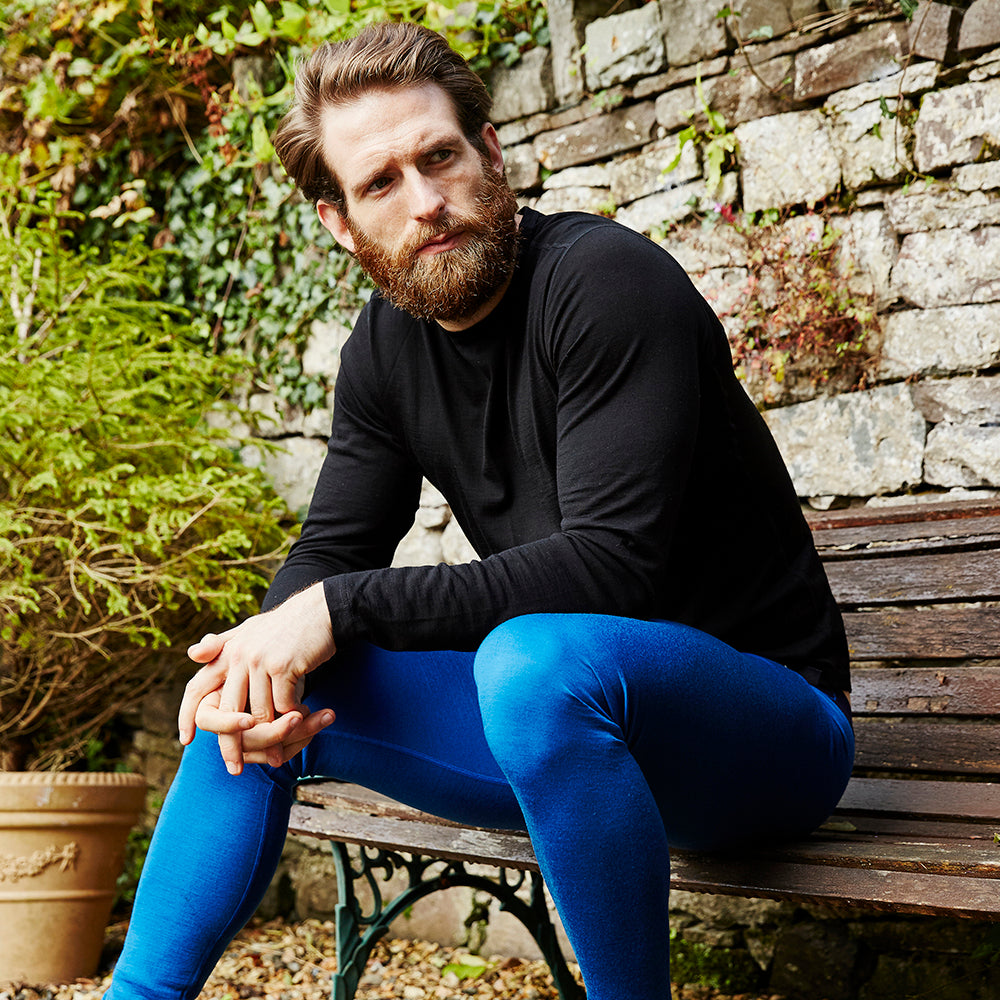 Isobaa | Mens Merino 200 Tights (Blue) | Conquer mountains, ski slopes, and sofa days with unmatched comfort in our 200gm Merino wool tights. | Model: Craig