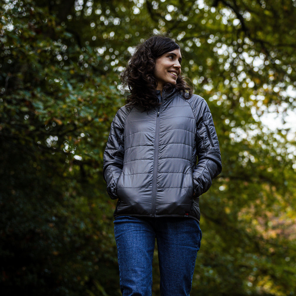 Isobaa | Womens Packable Insulated Jacket (Smoke/Black) | Exceptional warmth, packable convenience, and sustainable design with our lightweight Merino wool jacket. | Model: Clémentine