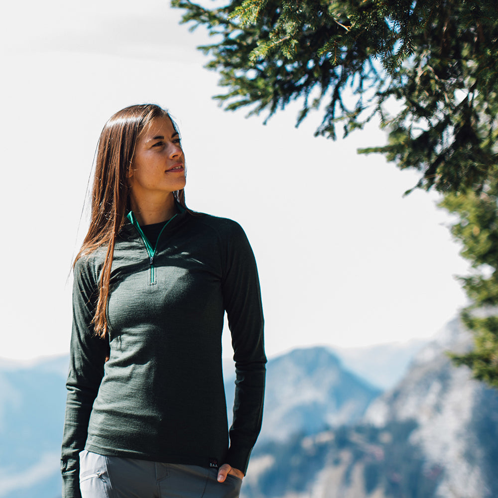 Isobaa | Womens Merino 200 Long Sleeve Zip Neck (Forest) | Experience the best of 200gm Merino wool with this ultimate half-zip top – your go-to for challenging hikes, chilly bike commutes, post-workout layering, and unpredictable weather. | Model: Jess