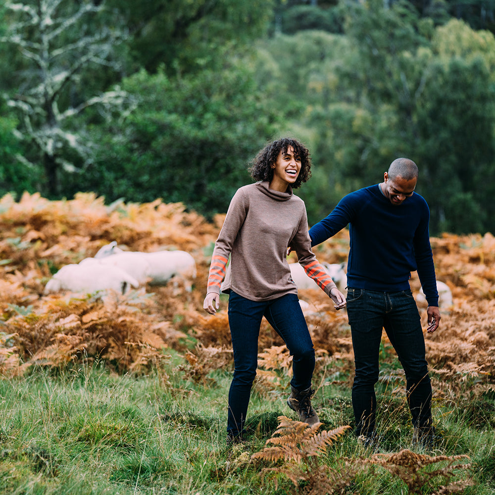 Isobaa | Womens Merino Roll Neck Sweater (Bran/Orange) | Discover premium style and performance with Isobaa's extra-fine Merino roll neck sweater. | Model: Micah